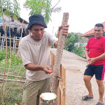 Sinergi Guru dan Alumni Perbaiki Pagar Sekolah Sambut HUT Gorontalo Utara ke-19